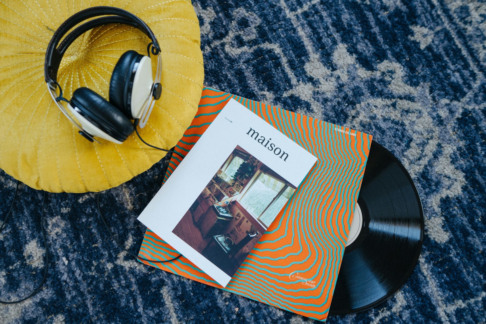 Brightly colored record and headphones